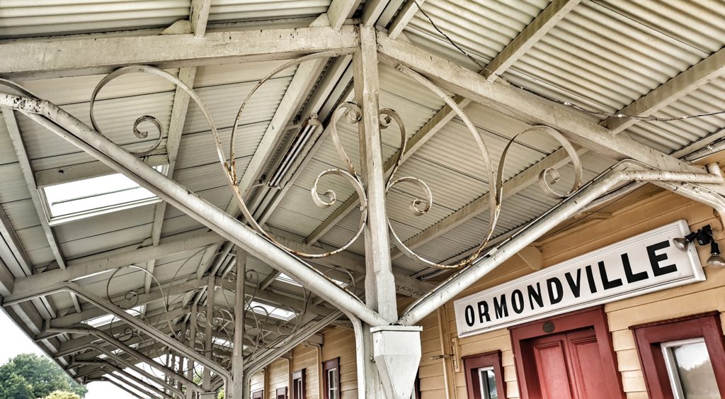 detail of metalwork of roof stays on an old railway station.