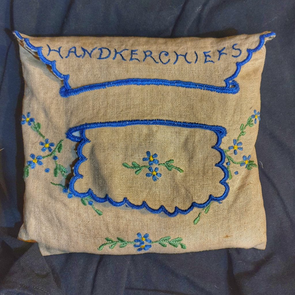 an embroidered linen pouch